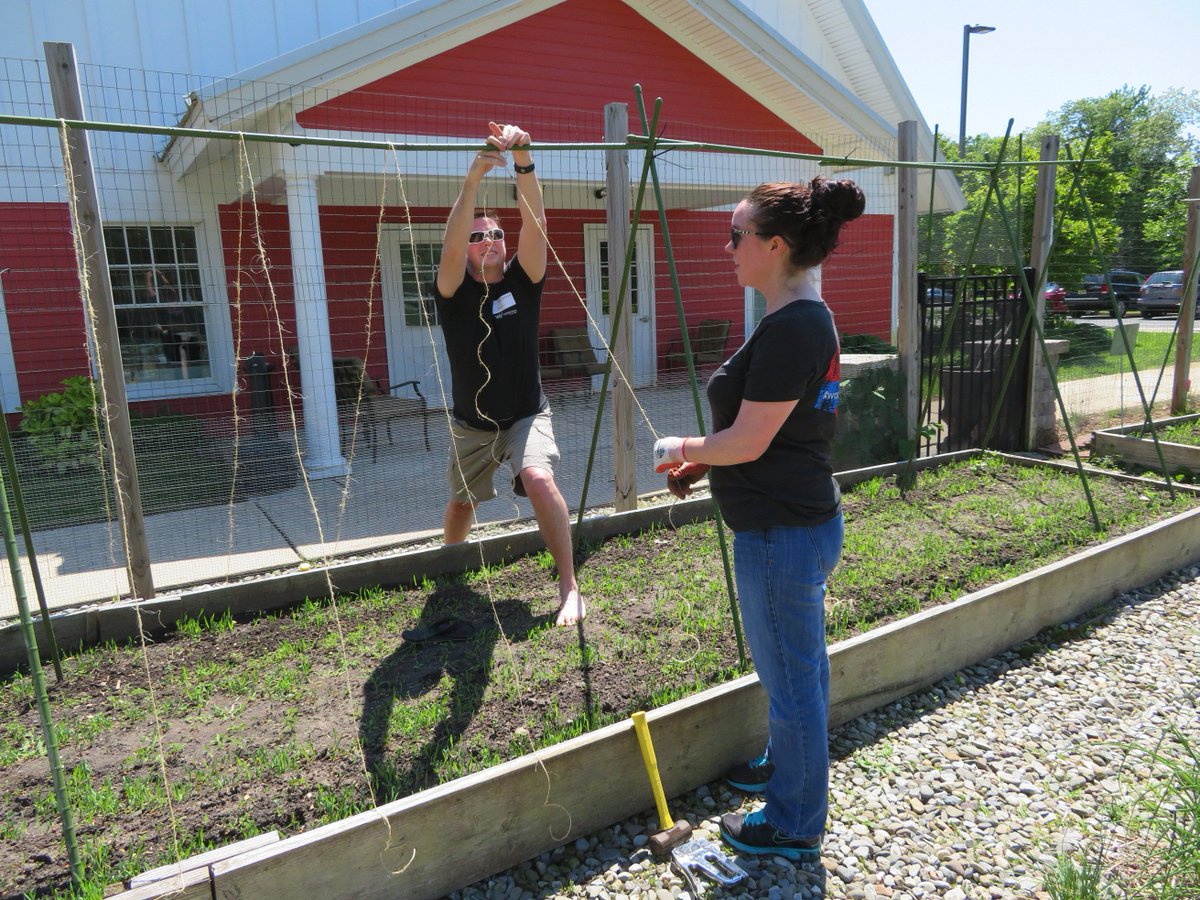 Workwave's tweet photo. We kicked off #MemorialDay weekend by volunteering in the @FulfillNJ garden! The crops grown here will help feed families in our local community. #WorkWaveCares https://t.co/t9OSnF39kc