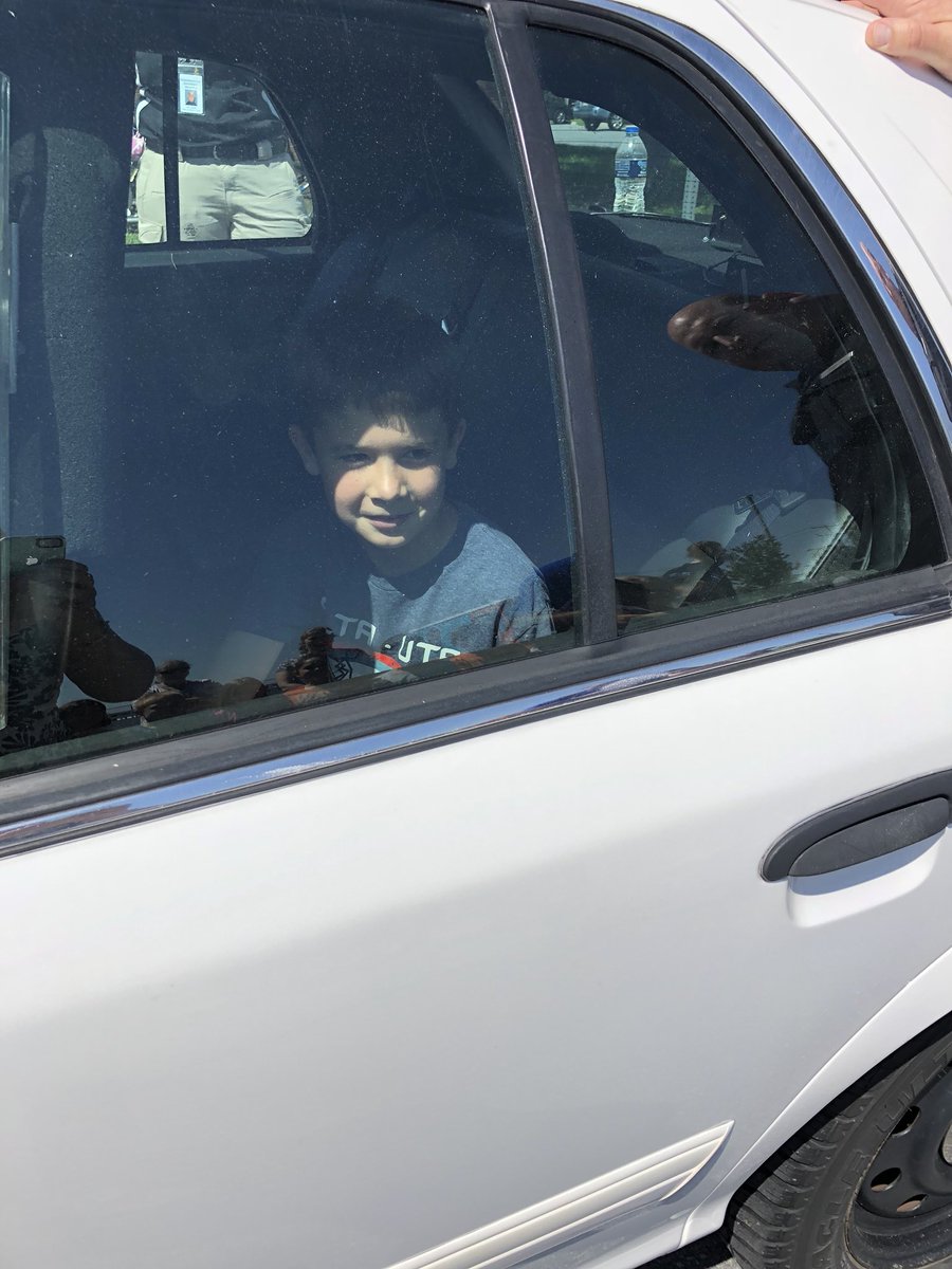 MrsElliott2nd's tweet photo. We had a great time at Vehicle Day... except for James. He ended up in the back of the police cruiser.  😂#easthighleaders https://t.co/tvg0Fdiatf