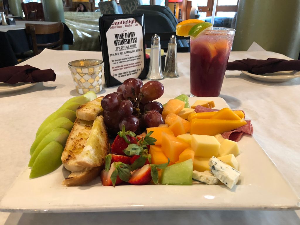 Fruit 🍉 Friday at Candlelight.  Enjoy a very refreshing Fruit 🍎 and Cheese 🧀 plate with one of our cool 😎 Summer Drinks🍷.  We are open until 11:00 p.m. tonight and midnight on Saturday.  #cooldrinks #cheeseplate #fruitplate #datenight #familyfun #friends #sangria