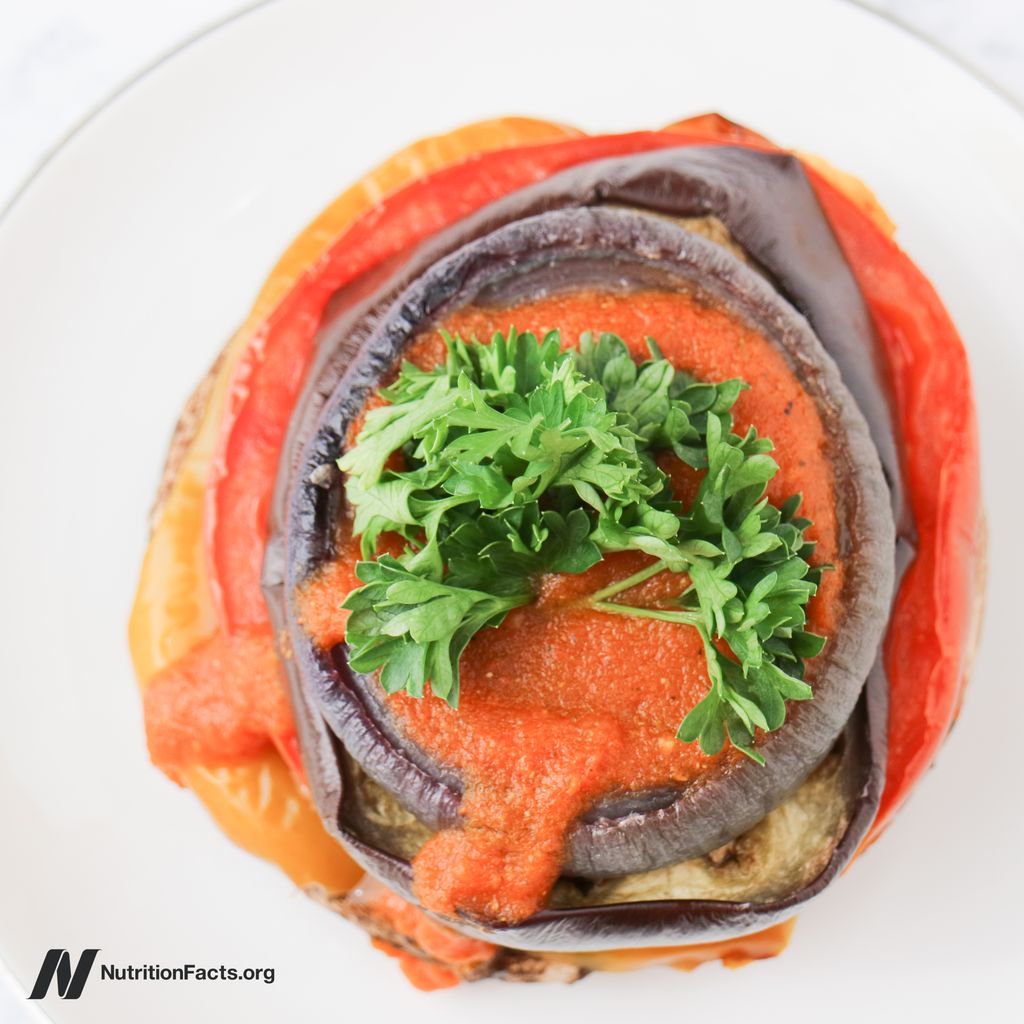 Beautiful and delicious vegetable stacks with tomato–red pepper coulis from the How Not to Die Cookbook. The recipe is on Nutritionfacts.org: 
bit.ly/VegetableStacks

#HowNotToDieCookbook