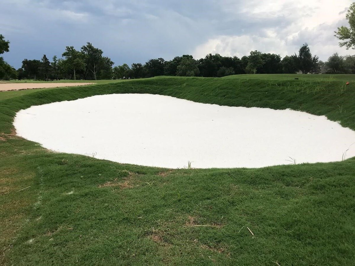 bergingolf's tweet photo. Just got these pics form our GM at @QuailCreekOK . 2.5” of rain on an old and new bunker.  Our design and @CapConGolf doing their job! @QC_Maintenance @QC_Golf_Shop https://t.co/bAywSNtVyG