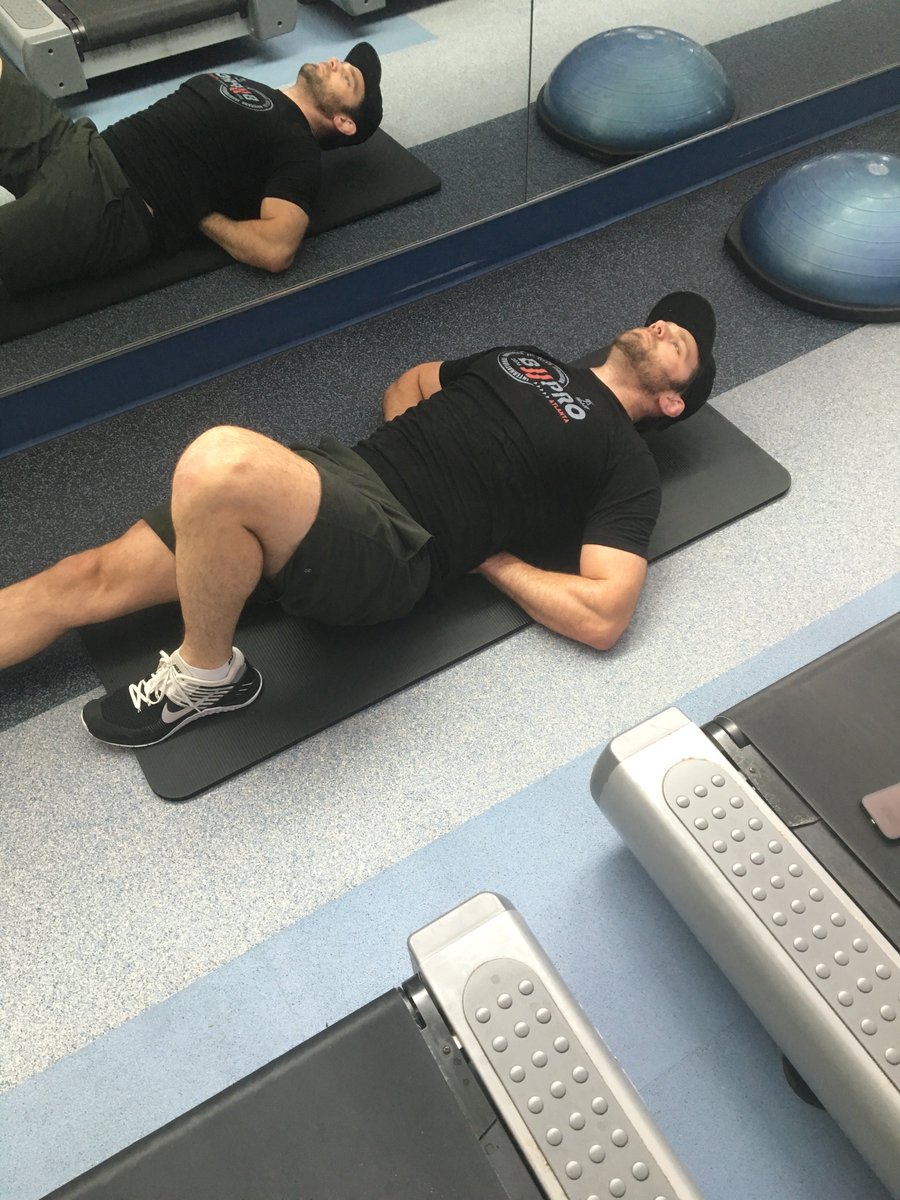JCharnoffMD's tweet photo. Low back pain guru Dr. Chris Moriarty pictured here demonstrating three exercises inspired by the great @drstuartmcgill that all athletes should add to their routine to enhance spine stability.1 curl up 2 side bridge 3 birddog #PMR #Physiatry #SportsMedicine #bjj @DMolinares_MD https://t.co/riogD5PlBj