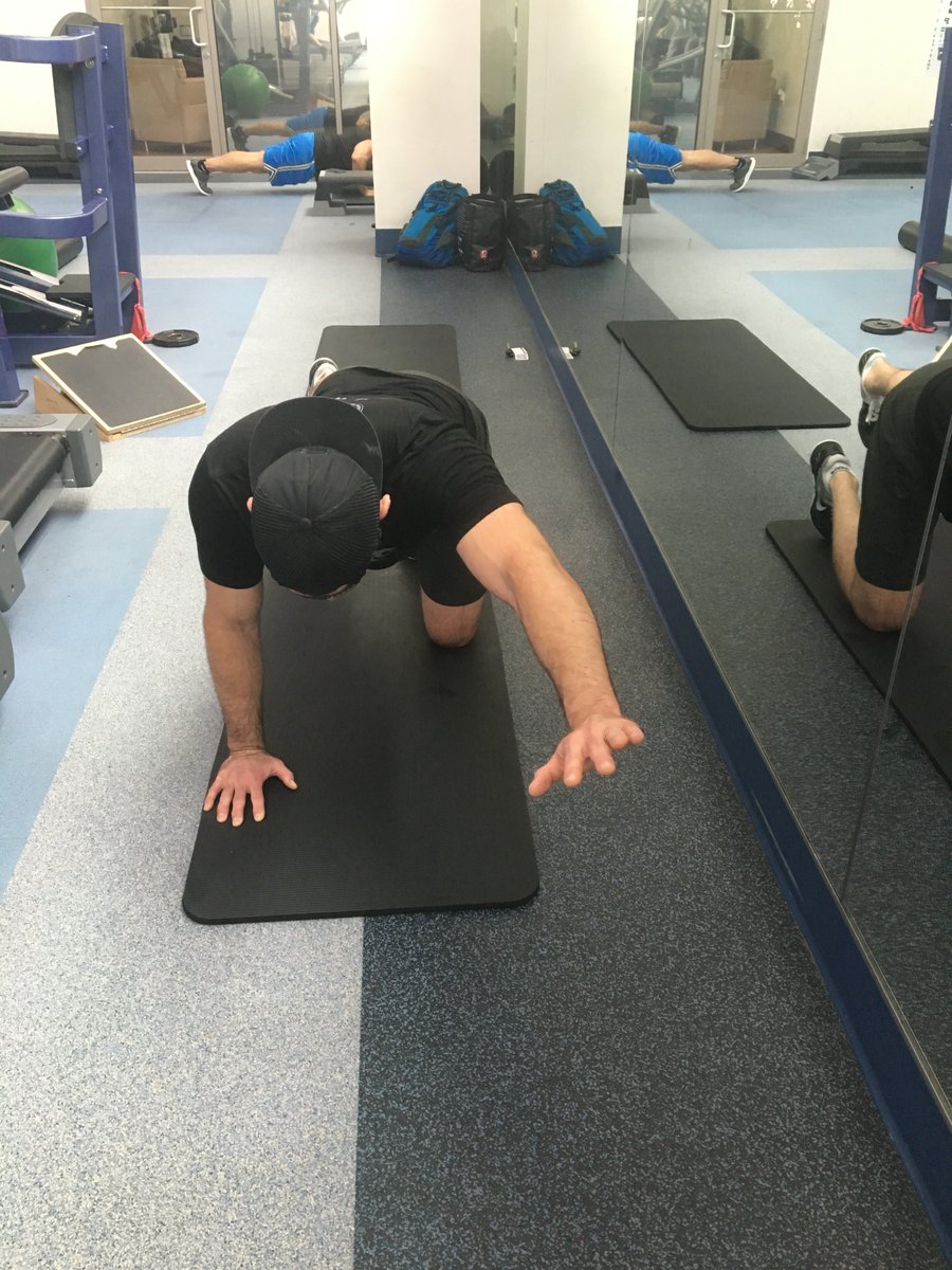 JCharnoffMD's tweet photo. Low back pain guru Dr. Chris Moriarty pictured here demonstrating three exercises inspired by the great @drstuartmcgill that all athletes should add to their routine to enhance spine stability.1 curl up 2 side bridge 3 birddog #PMR #Physiatry #SportsMedicine #bjj @DMolinares_MD https://t.co/riogD5PlBj