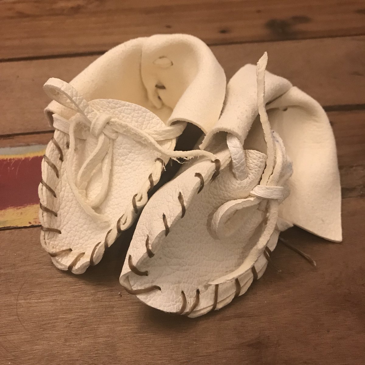 sjablack7's tweet photo. I was very touched today when on my last day before my maternity leave, a student presented me with moccasins that he had made for my new baby.  He learned how to make them because our school participated in the Moccasin Project.  For more info, go to https://t.co/xn6rXXWXGK https://t.co/5V3Bwg97uZ