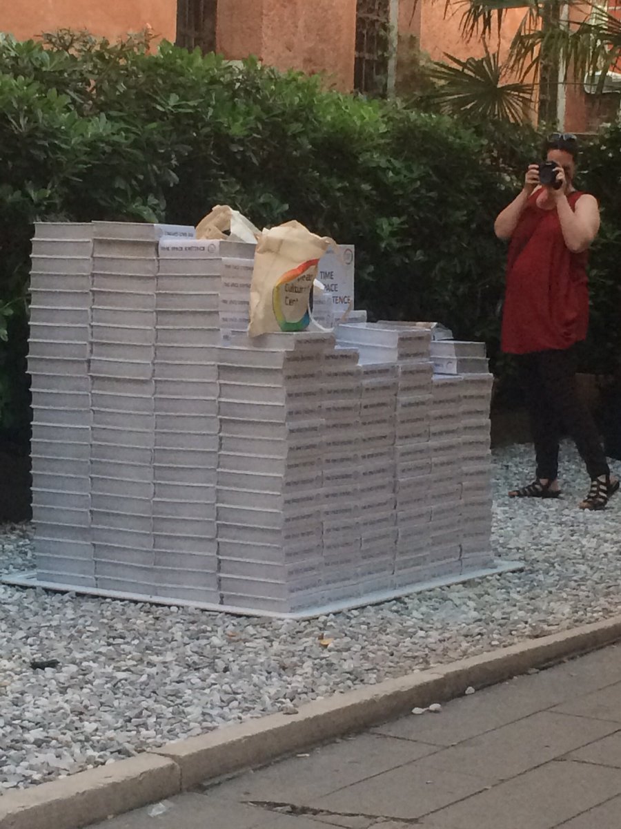 domthesculptor's tweet photo. The stack of catalogues at Palazzo Mora made a cool sculpture/architecture in it’s own right. @la_Biennale #europeanculturalcentre #TimeSpaceExistence #BiennaleArchitettura2018 https://t.co/B8MevrFoBA