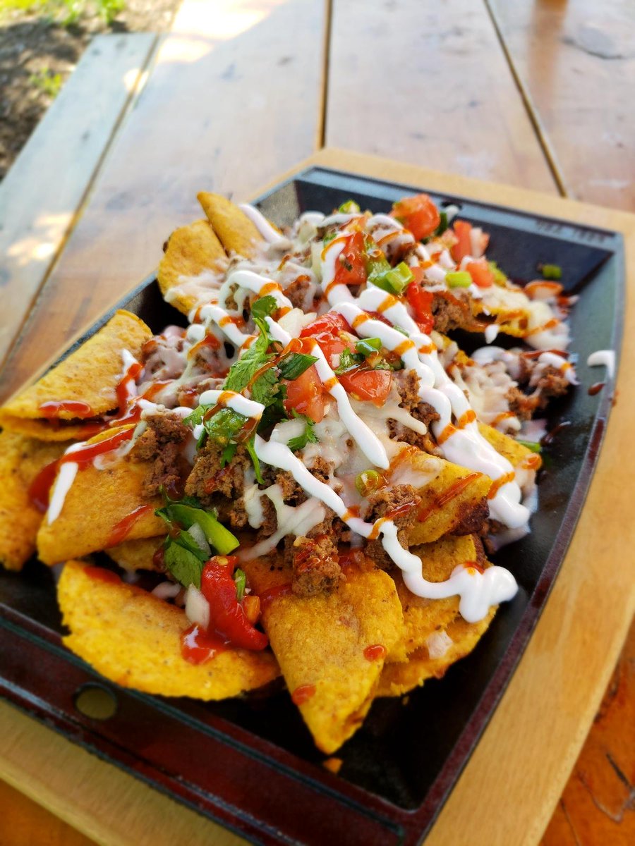 Bison Nacos 
Mini tacos with Bison Cheese sauce pico and sour cream #smoke #bbq #nachos #tacos #nacos