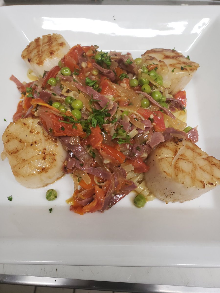 #summGrilled U- 10 scallops, Over tagliatelle pasta, Roasted tomato, Shallots, peas & Prosciutto with wine butter sauce