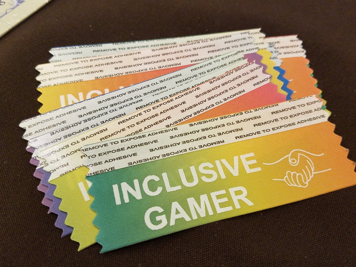 MeepleLady's tweet photo. I have more ribbons! Stop by D7 if you want one. #inclusivegamer #BGGSpring2018 https://t.co/ArEWapKNZs