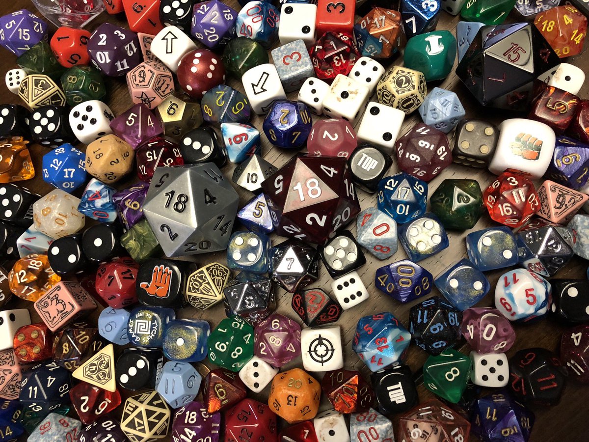 matthewmercer's tweet image. For those asking for a image of my home collection of mishmashed dice from over the years (still includes some from my first set, the simple green ones), here ya go.