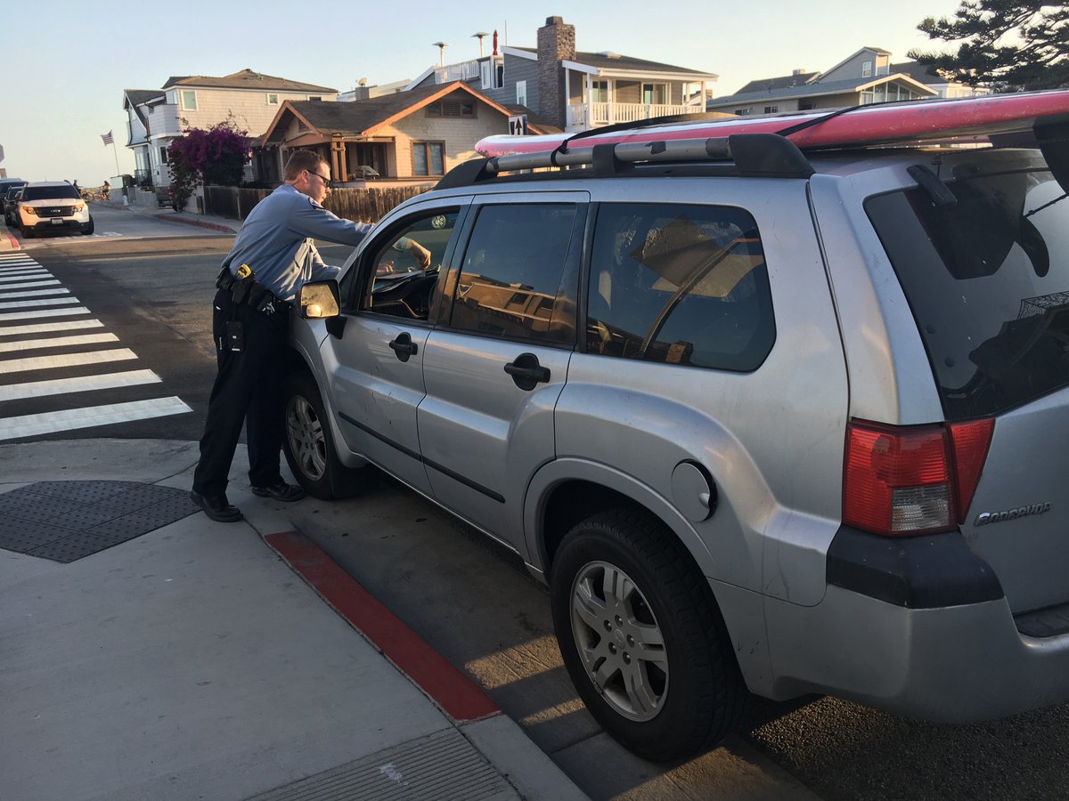 NewportBeachPD's tweet photo. As we were driving down Balboa Boulevard, this SUV caught Nick’s eye. It’s parked in a red zone, partially blocking a wheelchair ramp. It’s getting a paring ticket.

#NBPDVRA #NBPDACO https://t.co/hnqILUriNn