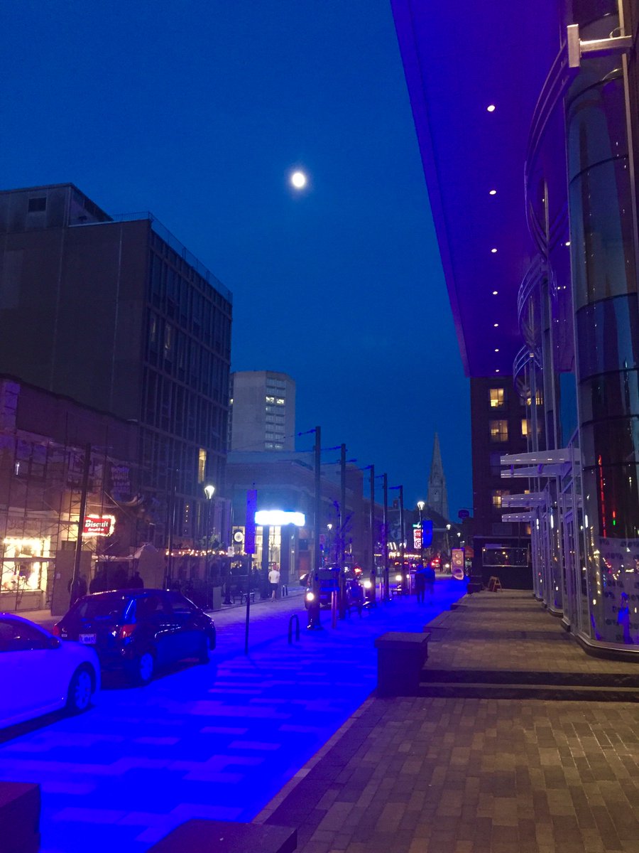 TomBeyer7's tweet photo. A purple glow envelopes Argyle St on a Halifax Saturday night! #CBAC2018 #Halifax #Conventions @hfxconventions https://t.co/EsJZSjSQEs