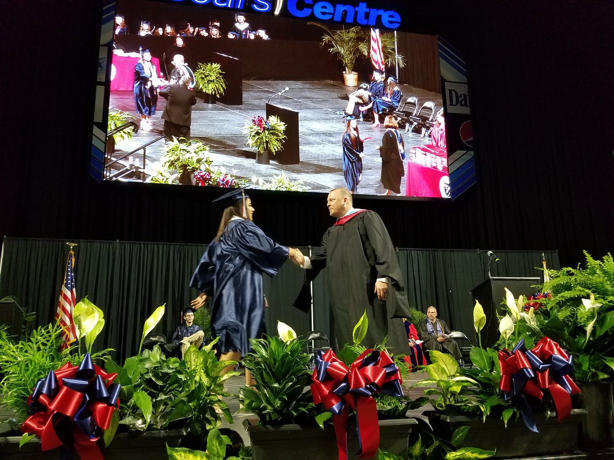 sdu46's tweet photo. South Elgin High School Principal  Brian Moran in action.
#U46Classof2018 https://t.co/kJGnt98r9V