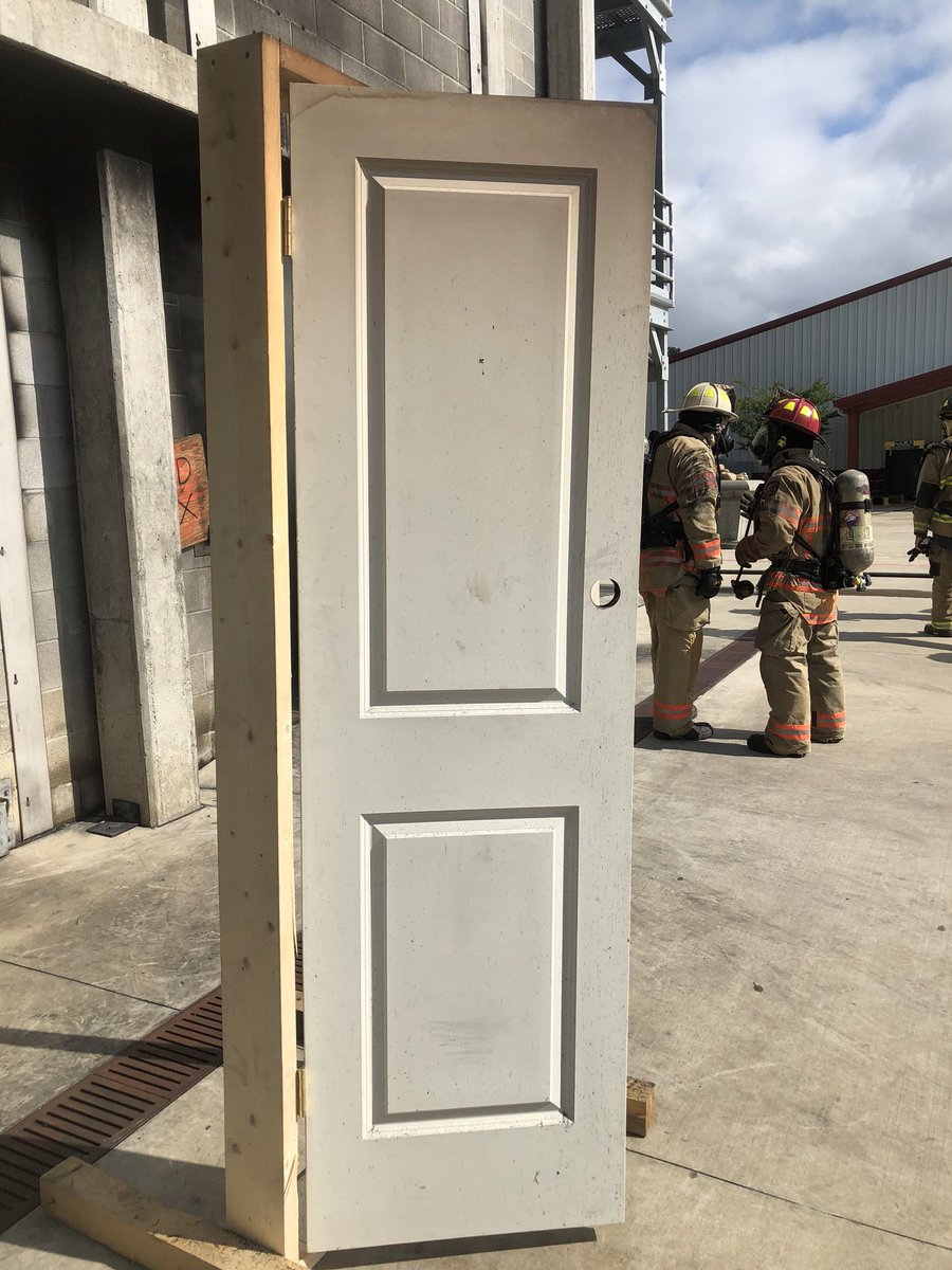 IAFF_4047's tweet photo. This is a hollow core interior door. It was in a large fire room, subjected to fire conditions of over 1100 degrees 3’-4’ away for 15-20 minutes 2x today. The opposite side of the door was 150-200 degrees in the same open room (no walls)! #maffc #firefighter #fire https://t.co/TK8qErzcEs