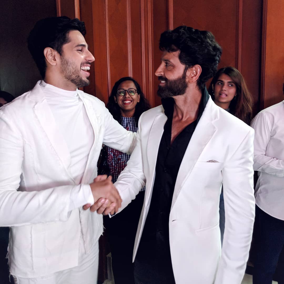 gqindia's tweet photo. 2 Dudes in White. @S1dharthM and @iHrithik go against the grain at #GQBestDressed. https://t.co/RvZhIdLGQz