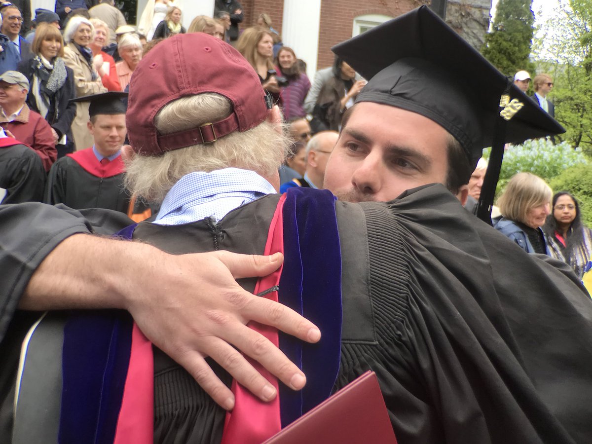 BatesCollege's tweet photo. One of our favorite Commencement traditions. Students and their teachers embrace after the recessional. #Bates2018 #batesgrad https://t.co/kXtRfUcK8t