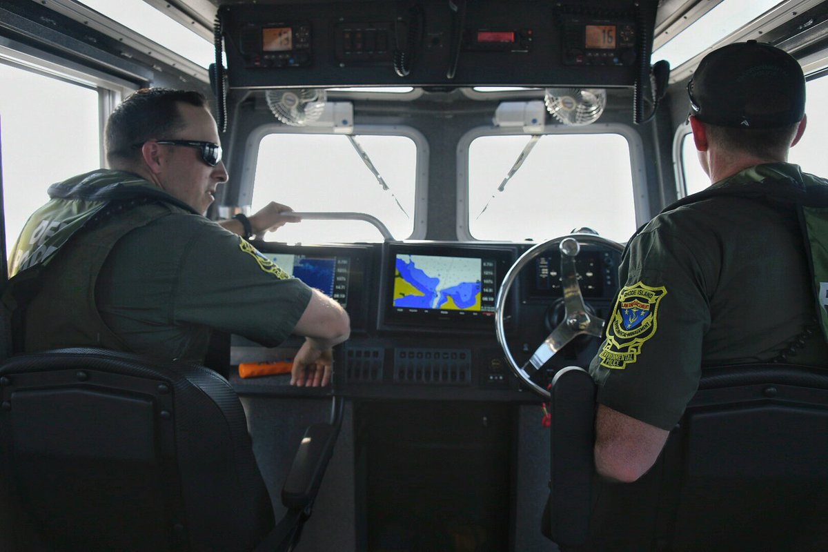 RhodeIslandDEM's tweet photo. Yesterday Officers from DEM Division of Law Enforcement (DLE) responded to a call from the USCG for a diver in distress off of Ft. Wetherill State Park. EPO Jeff Mercer &amp; EPO Harold Guise responded to the call &amp; were able to bring the divers aboard &amp; to shore to be assessed. 1/2 https://t.co/uKiS4KaV1X