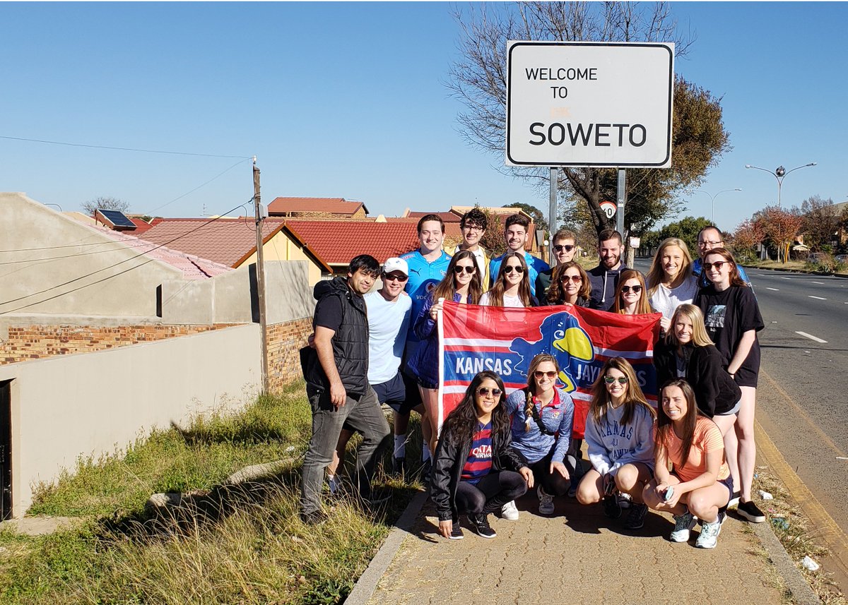 JayhawkAlee's tweet photo. @KUMAccProgram students learning about the Soweto township; famous home for Nelson Mandela, Desmond Tutu, and Trevor Noah during apartheid segregation. #studyabroad https://t.co/gZV78m89cJ