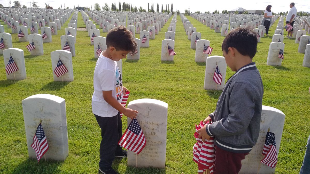 CA_DaveJones's tweet photo. With my father-in-law Navy Veteran Louis F. Flores &amp; our family placing flags at Sacramento Valley Nat’l Cemetery. Honor vets. #MemorialDay https://t.co/y5cwa5Vbf9