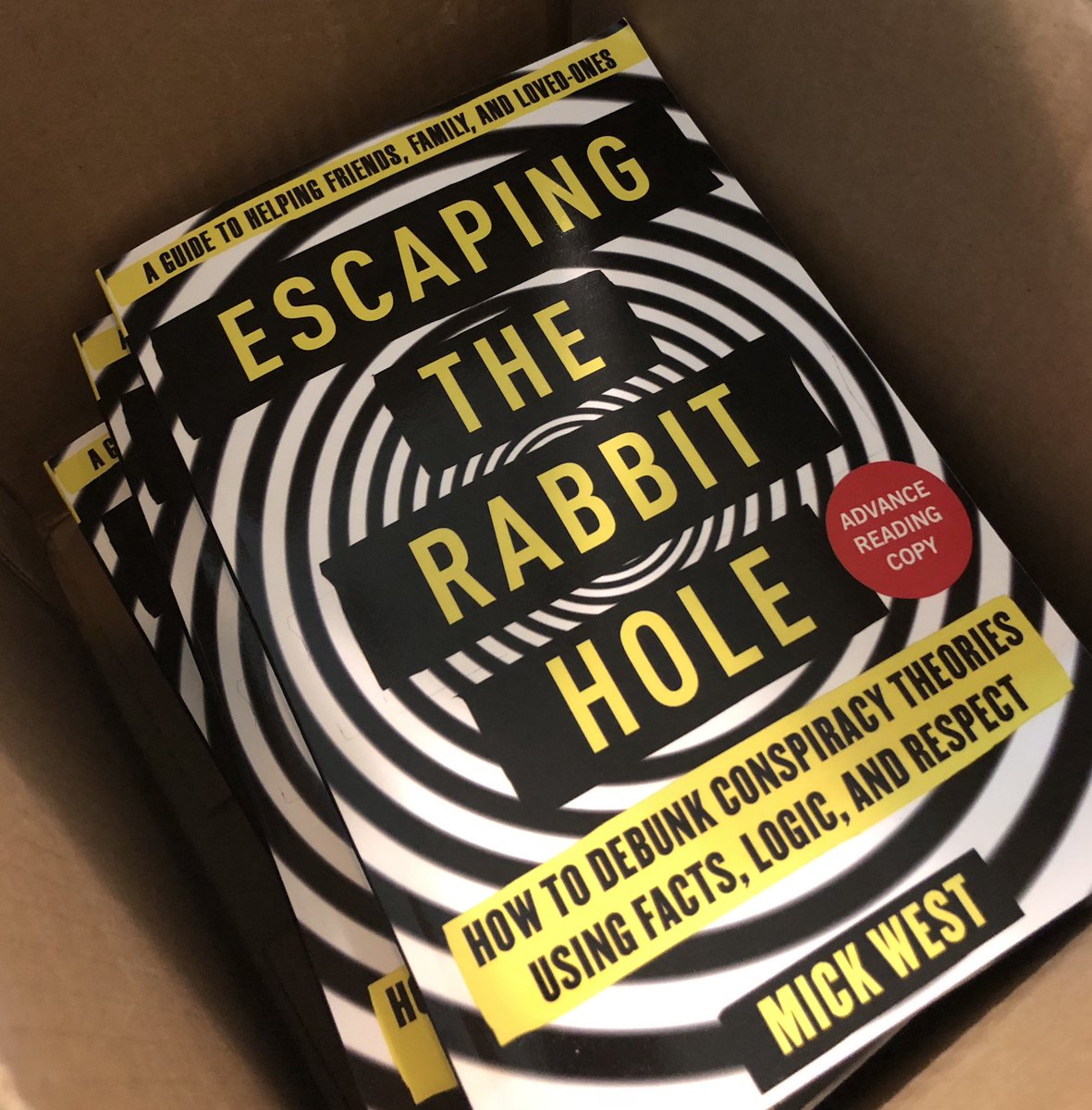 MickWest's tweet image. My box of Advanced Reading Copies of &quot;Escaping the Rabbit Hole - How to Debunk Conspiracy Theories using Facts, Logics, and Respect&quot; finally arrived! It&apos;s available for sale on 9/18, preorder available now. amzn.to/2Jtwaz8