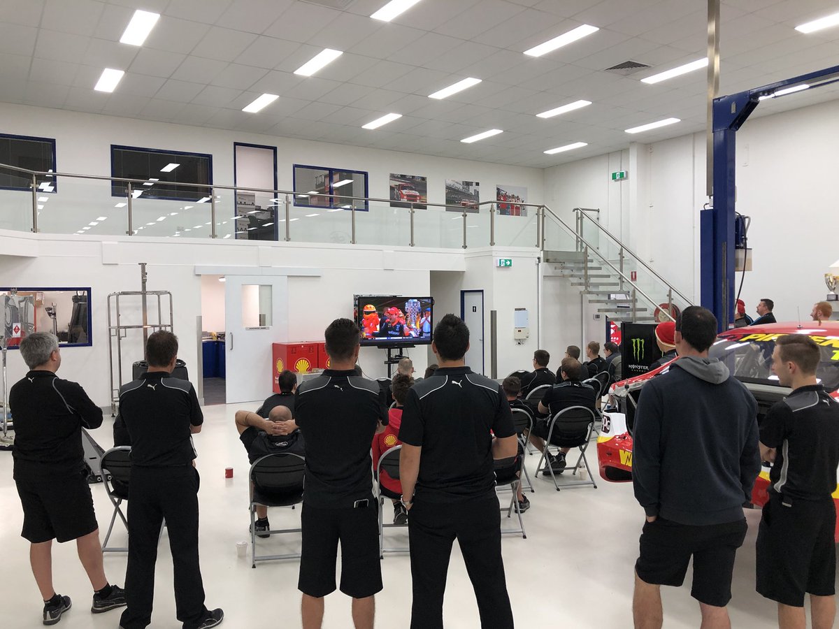 ShellVPowerRT's tweet photo. The team gathered at the workshop nice and early to catch the Indianapolis 500. A HUGE congratulations to our very own @12WillPower for the win! 🏁🏆🏁🏆 #oneteamonedream #Indy500 https://t.co/nZtoBwIGxp
