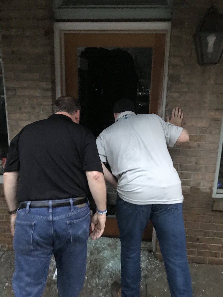GovLarryHogan's tweet photo. Walking through downtown Ellicott City surveying the damage with Lt. Governor @BoydKRutherford, County Executive Kittleman, and emergency management personnel from the county and state. We stand in solidarity with Ellicott City and Howard County. We are #EllicottCityStrong. https://t.co/tlbU5b3wYQ