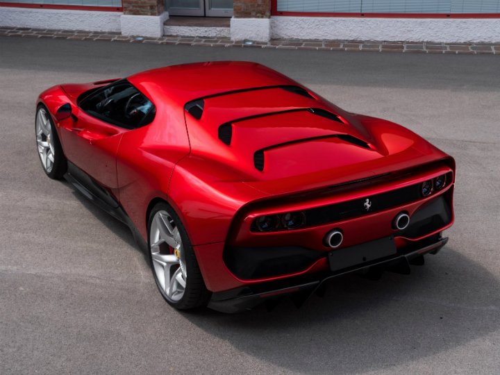 Zigwheels's tweet photo. Looks like someone's taken the best bits from different @Ferrari cars and moulded them to create the one-off #Ferrari #SP38. Makes public debut at the 2018 Concorso d'Eleganza Villa d'Este. Details - https://t.co/avtpzejAbd
#FerrariSP38 #Ferrari488GTB https://t.co/SG0ZB6GuP5