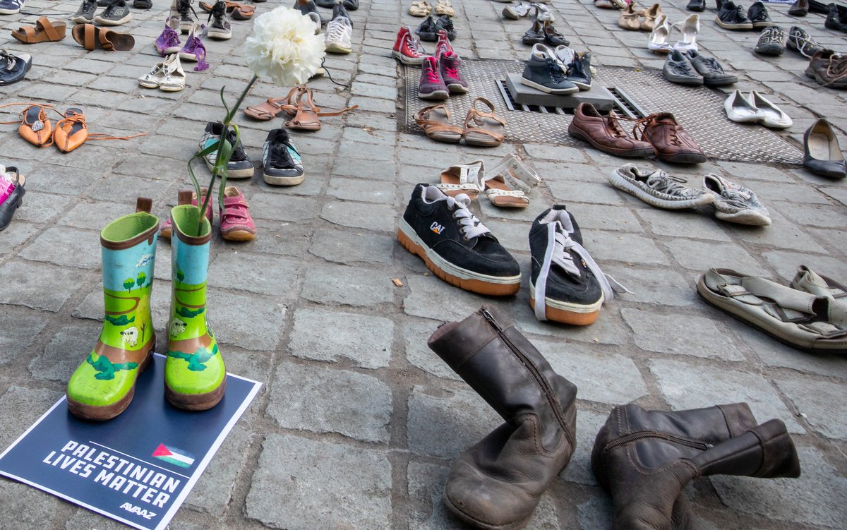 Avaaz's tweet photo. #PalestinianLivesMatter: As EU Foreign Ministers gather today, 4,500 pairs of shoes are on display in the heart of Brussels -- one for every life lost in the conflict over the last decade. More than 785,000 of us are calling for sanctions on Israel: https://t.co/ZxJsfz9ueF https://t.co/y5L0vm9JHN