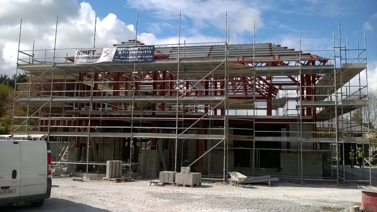 LBSproducts's tweet photo. A new build WIP in Co Offaly. A steel frame skeleton - but with a very traditional feel. #BangorBlue Slates #HoctorSmythArchitects https://t.co/pBbK12EvzG