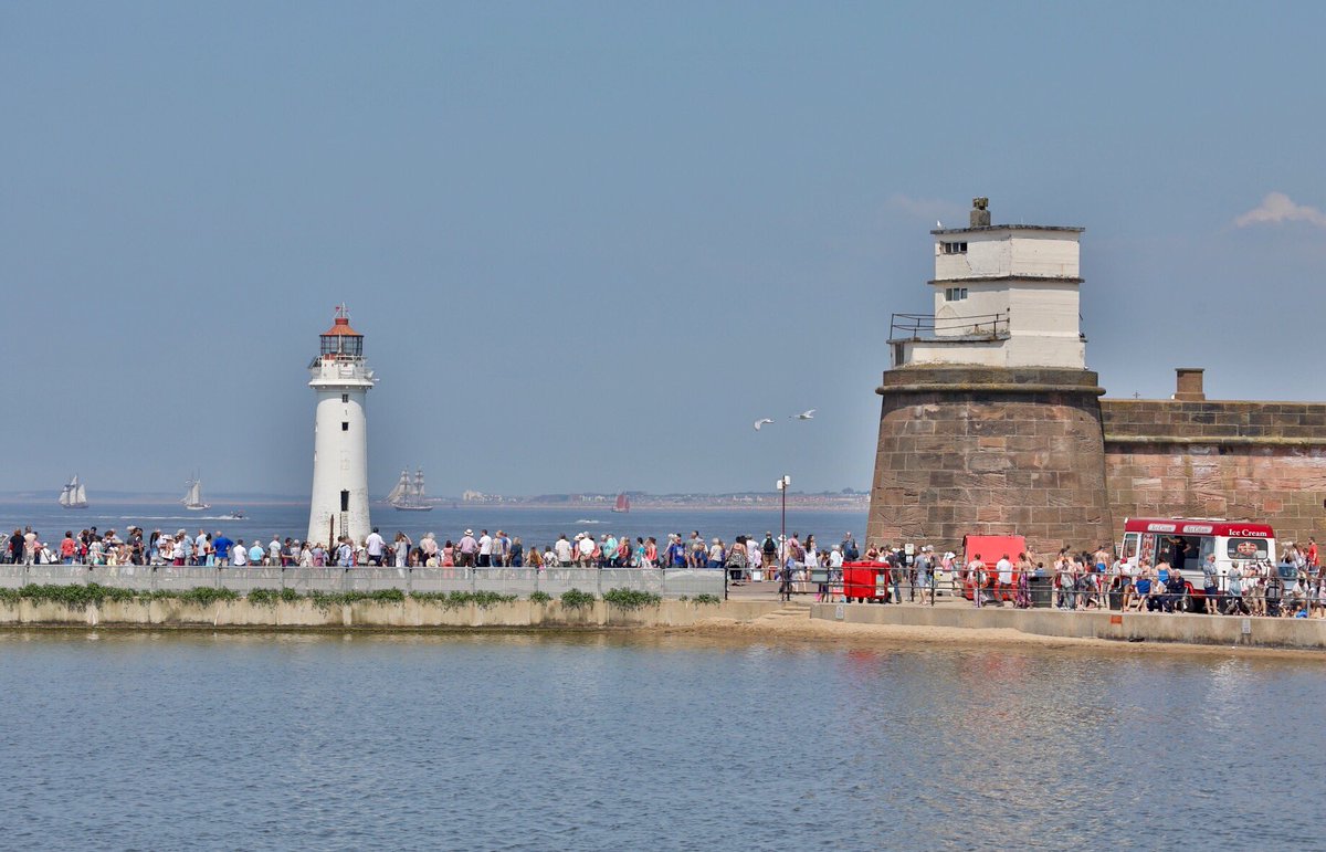 photolpool's tweet photo. The Tall Ships head out into the Irish Sea with Perch Rock Lighthouse &amp; Fort in the foreground taken from New Brighton #TallShipsLiverpool @imaginewirral @Wirral_Weather @NewBrighton_ @WIRRALGLOBENEWS @WirralCouncil @TallShipsRaces https://t.co/RTeqCtkgDa