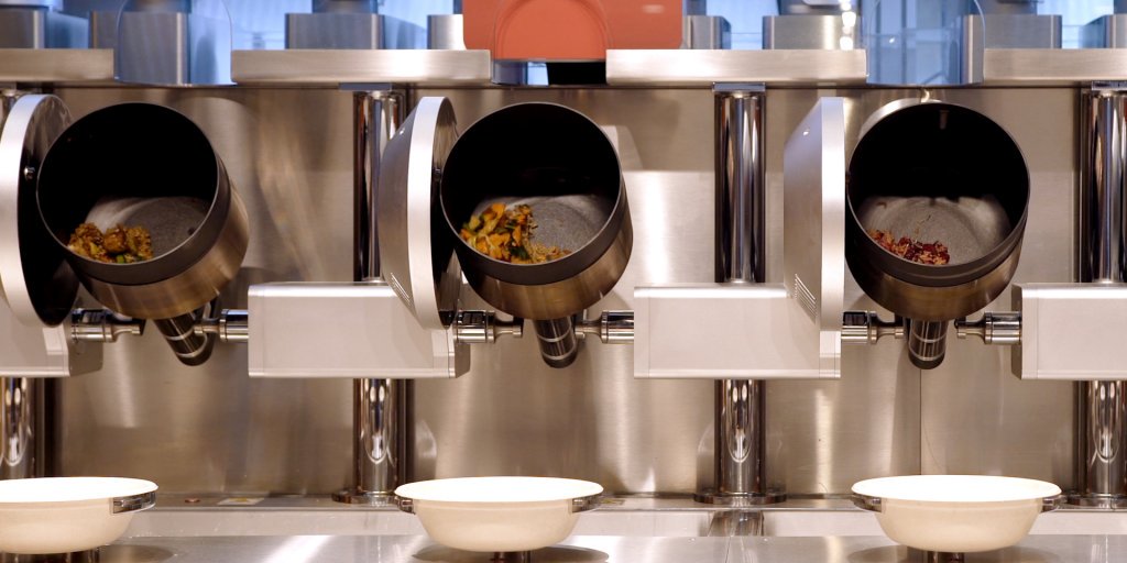 BusinessInsider's tweet photo. Spyce restaurant uses a robotic kitchen to cook your food https://t.co/qloyZYdxfi https://t.co/vxcFPl8BUH