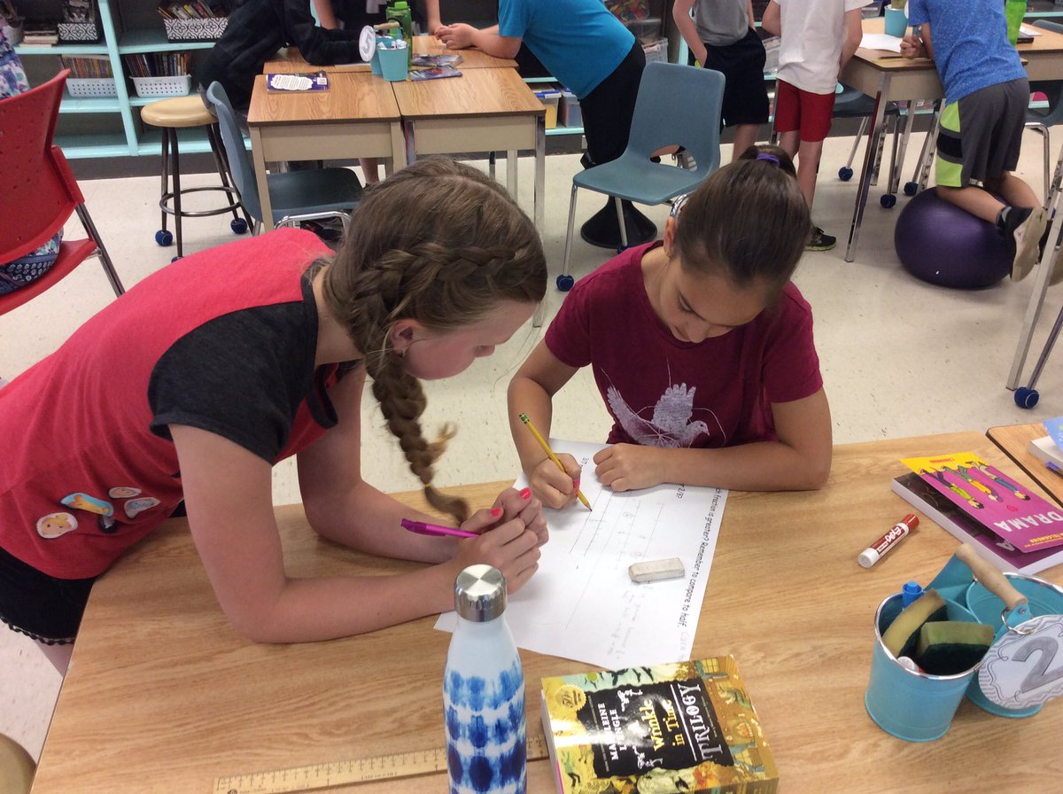TerpstraUTES's tweet photo. Lots of fraction work today. We used # lines and our chocolate bar strategy to compare fractions. #itsgettingeasier https://t.co/GgWfF4vE1C