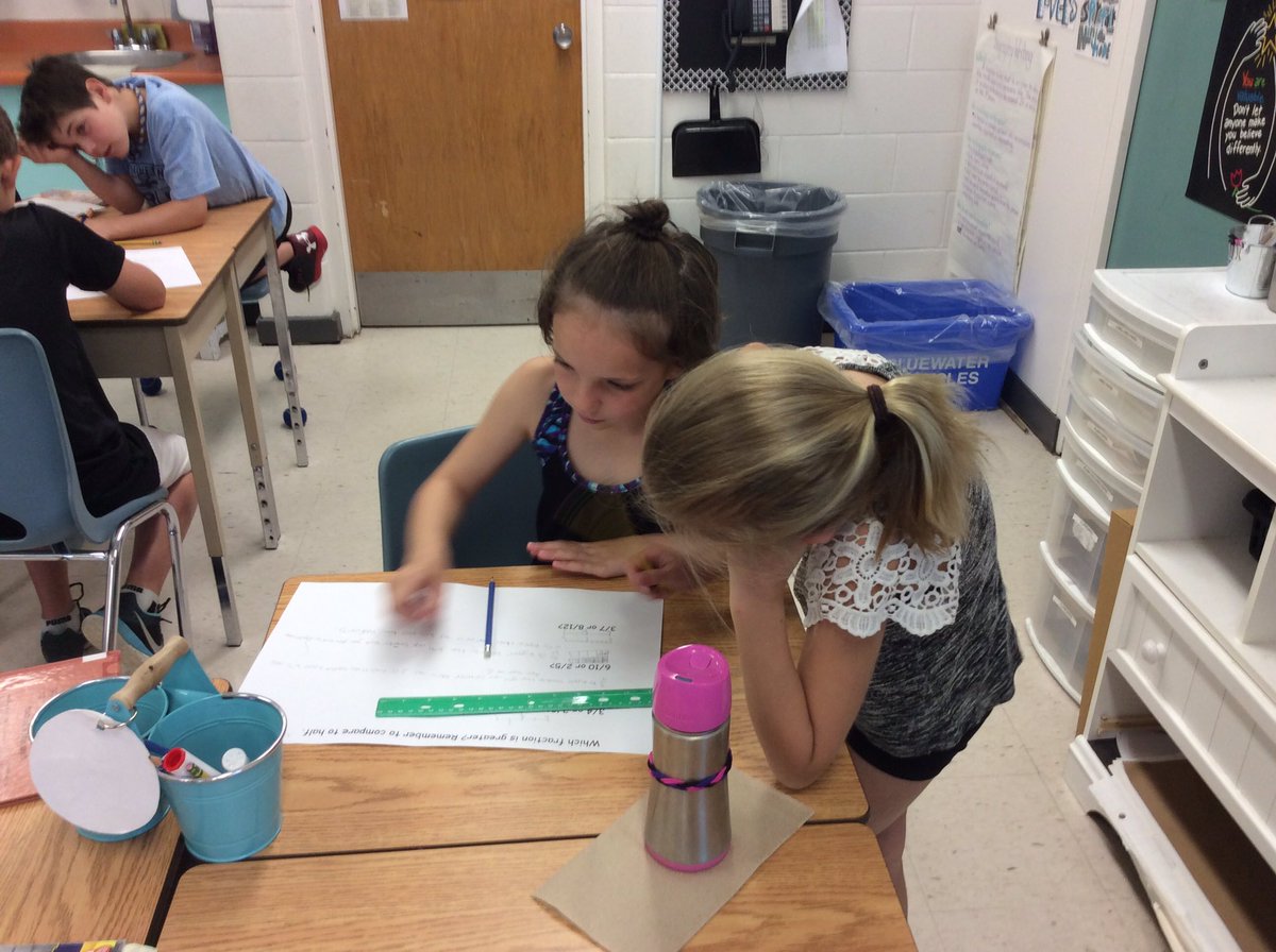 TerpstraUTES's tweet photo. Lots of fraction work today. We used # lines and our chocolate bar strategy to compare fractions. #itsgettingeasier https://t.co/GgWfF4vE1C