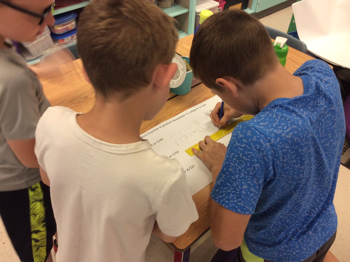 TerpstraUTES's tweet photo. Lots of fraction work today. We used # lines and our chocolate bar strategy to compare fractions. #itsgettingeasier https://t.co/GgWfF4vE1C