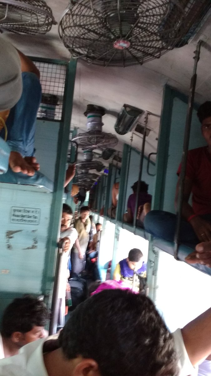 paawak's tweet photo. @RailMinIndia I was travelling on the HowrahYeshwantpurExp, 12863, on 26May.The train was filthy, with lots of without ticket passengers crowding the sleeper coaches. Absolutely no regrads to safety. The TTE and RPF on board, just turn a blind eye,for a price. #IndianRailSucks https://t.co/aKcQ6YQhND