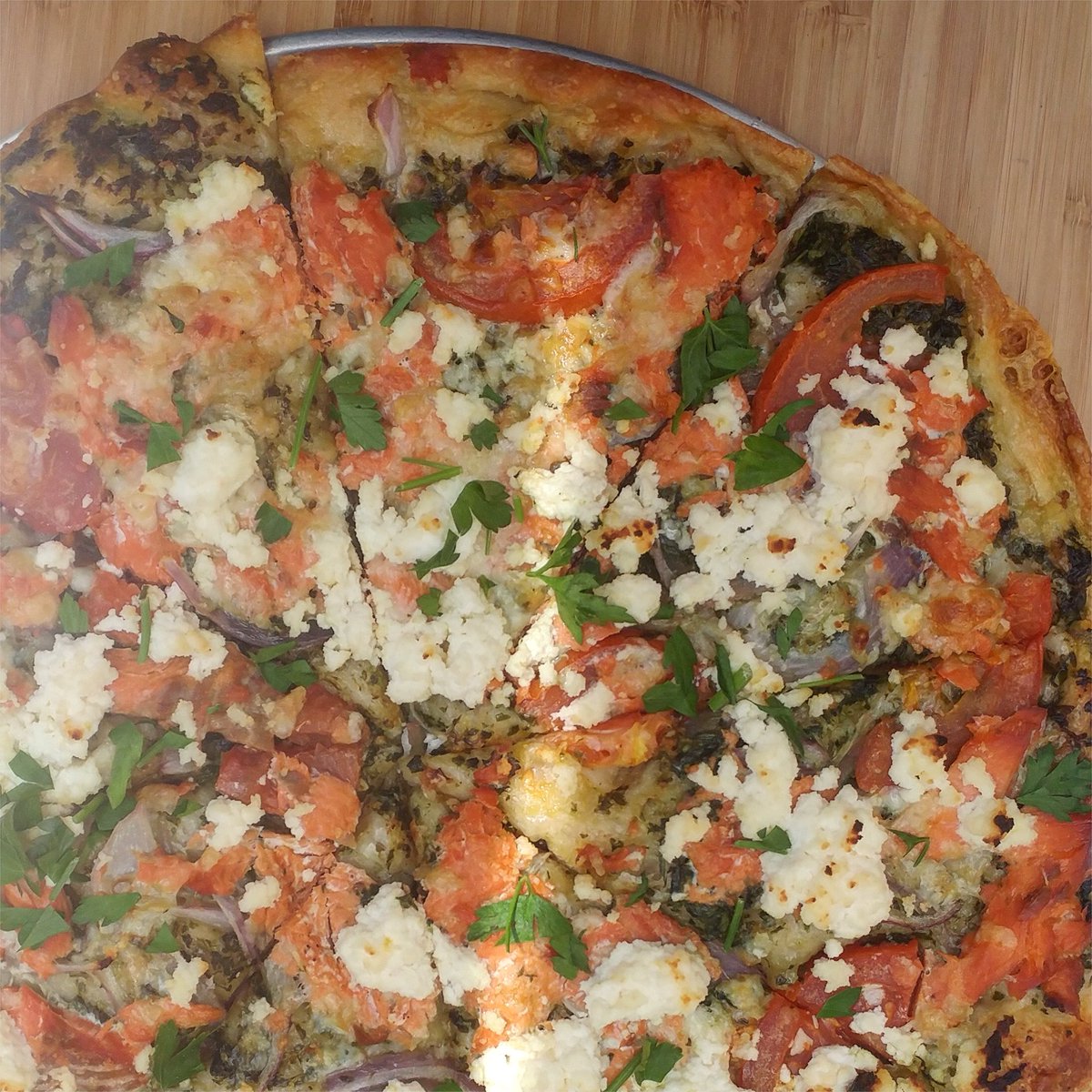 Pesto Salmon | House-smoked salmon, baked salmon, red onion, tomato, lemon-scented ricotta, house-made pesto. Get em while supplies last!! #yyj #yyjfood #yyjfoodie #yyjeats