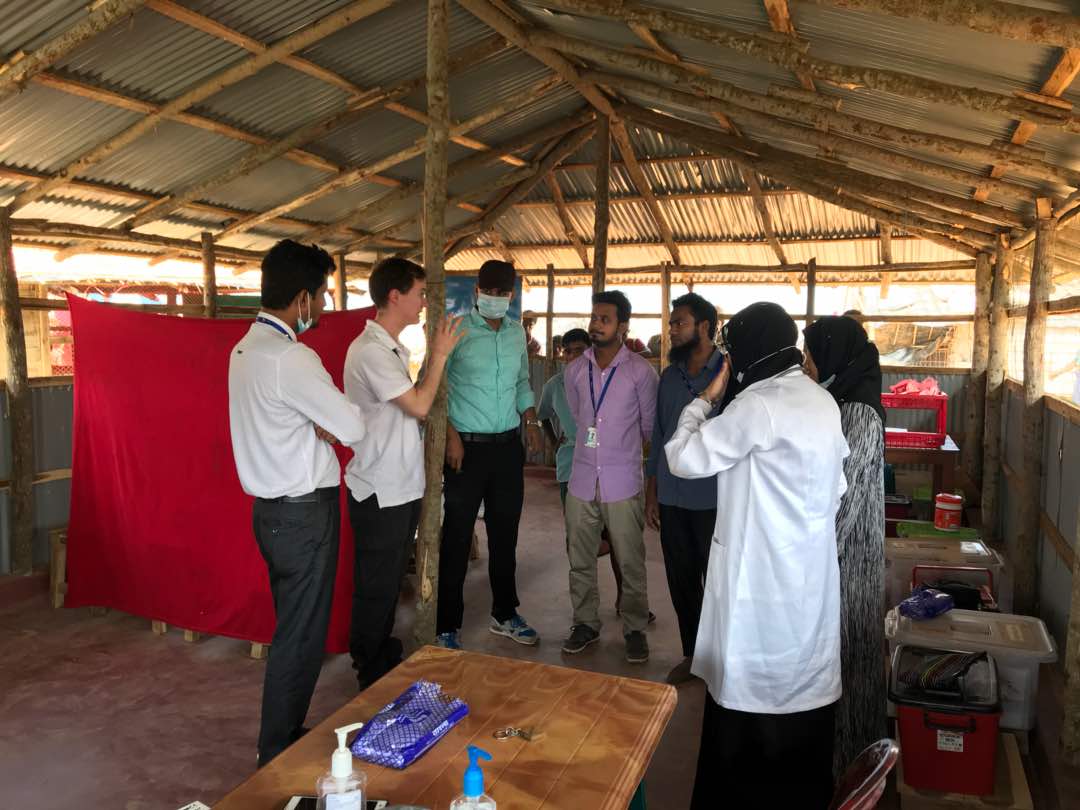 mhuk_mercy's tweet photo. Update 1 - From our main volunteer Dr Tom at the Rohingyas refugee camp in Cox’s Bazar, Bangladesh. 
Dr Tom giving the team briefing at Kutupalong primary health care clinic. This is an opportunity to address any issues, weather/health sector updates and reinforce the routines. https://t.co/BZtZjvkXJ2