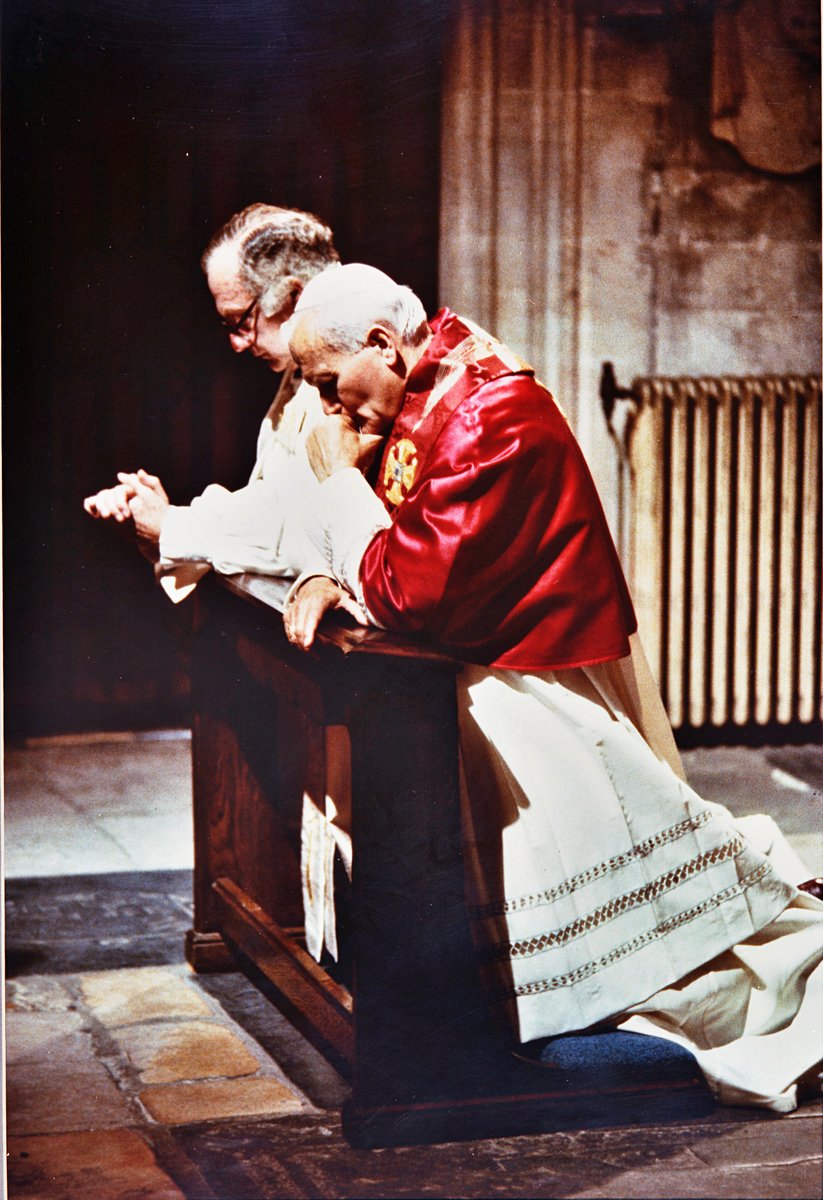 CburyCathedral's tweet image. On This Day 1982.
Pope John Paul II made a historic visit to Canterbury Cathedral - the first pontiff ever to do so. 
The Pope was greeted by the Archbishop of Canterbury Robert Runcie. Together they knelt in silent prayer at the spot where Thomas Becket was murdered in 1170 #OTD