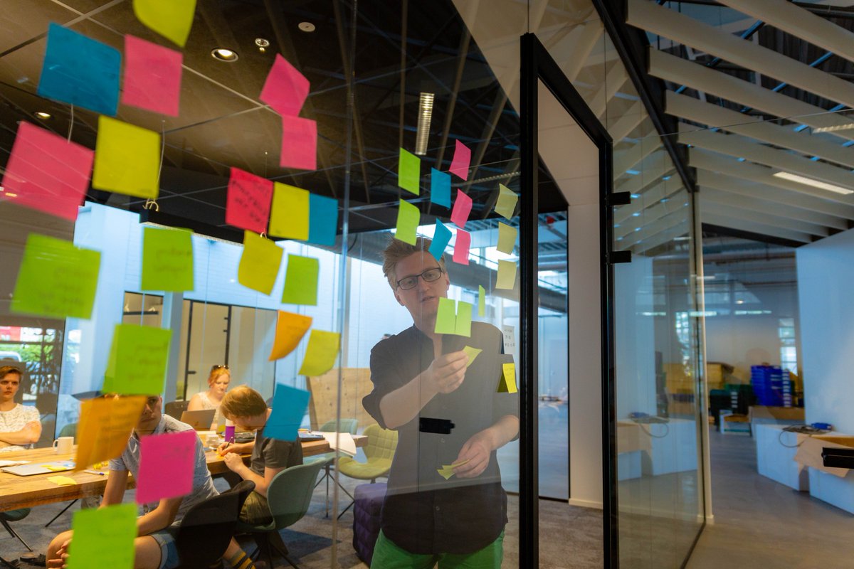 SayHelloLily's tweet photo. The first Lily team meeting in our new office - we made great use of the glass walls as we brainstormed how Lily should grow and develop in the future. #development #CRM #teamcollaboration https://t.co/kWVlAAWjlY