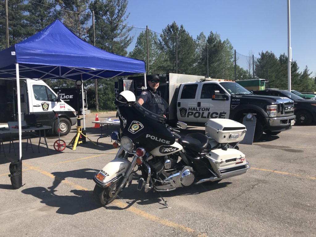 HRPSCMV's tweet photo. The Squad is setup @HaltonPolice #ESINC Day display at Police Head Quarters. We are here with the #TrafficServices Team along with The Collision Reconstruction Unit and Motor Officer Borak with the Police Motorcycle. ^pm https://t.co/I9SGnObdc8