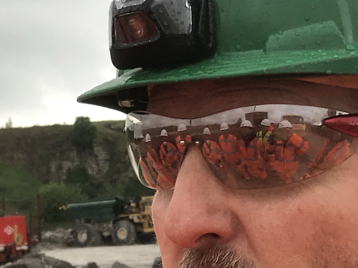 DrRobMcCaffrey's tweet photo. Visitors in full PPE are reflected in the quarry manager’s safety glasses during a field trip by international delegates from the Global #CemProcess conference to #Breedon Group’s Hope cement works in Derbyshire on 25 May 2018. https://t.co/oONrYx27Qj