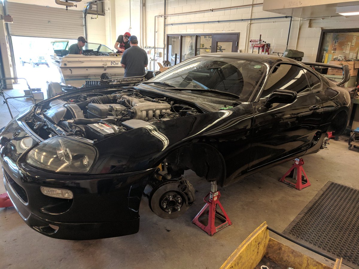 TwinTechEd's tweet photo. Twin Lakes Auto students doing some impressive repairs.   Pads rotors calipers brake bleed - CV shaft replacement - ABS speed sensor - and the supra engine swap is running in time for Thundershow.  @SCDSB_Schools https://t.co/b6SF5YstBu