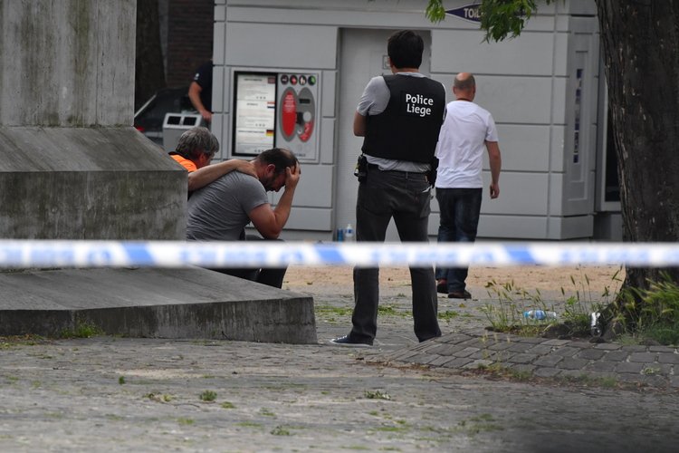NewstalkFM's tweet photo. Prisoner on release kills two police officers with their own guns in apparent terror attack in Belgium: https://t.co/4HFEpe9ZPg #Liege #Liegeshooting #BelgiumAttack https://t.co/8gNLW0aZxH