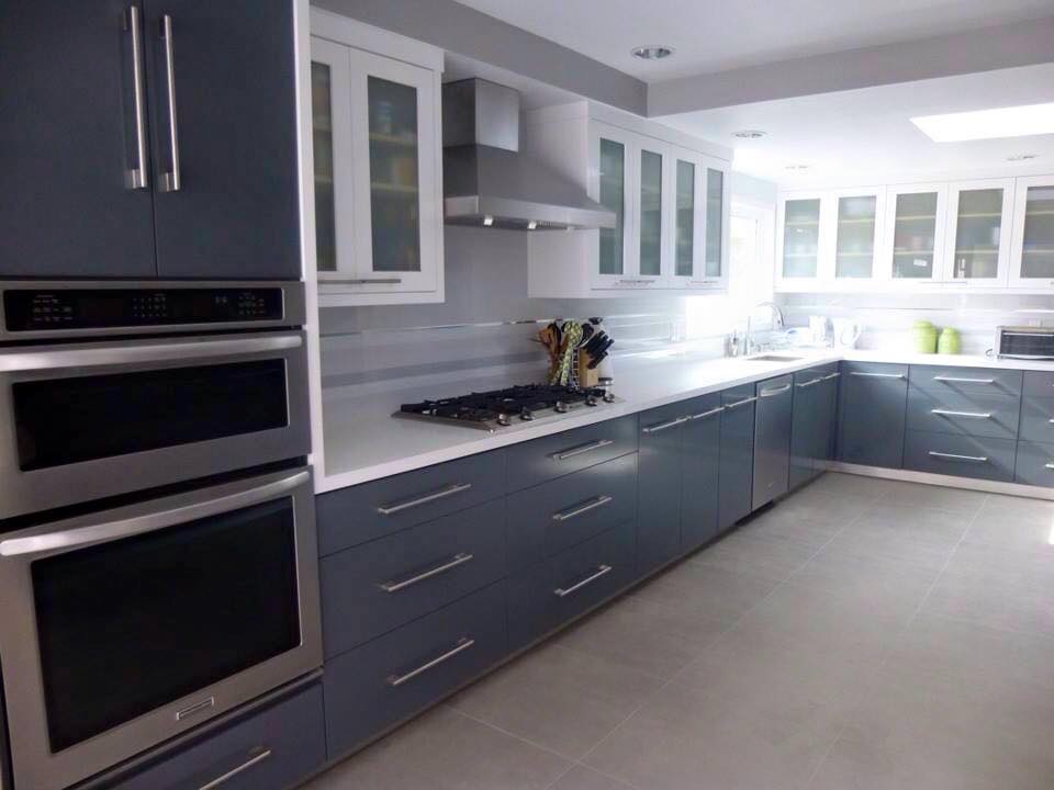RemodelingA's tweet photo. #Kitchen remodel with beautiful blue cabinets that make the kitchen pop. What do you think? https://t.co/VV3dHw7bXq