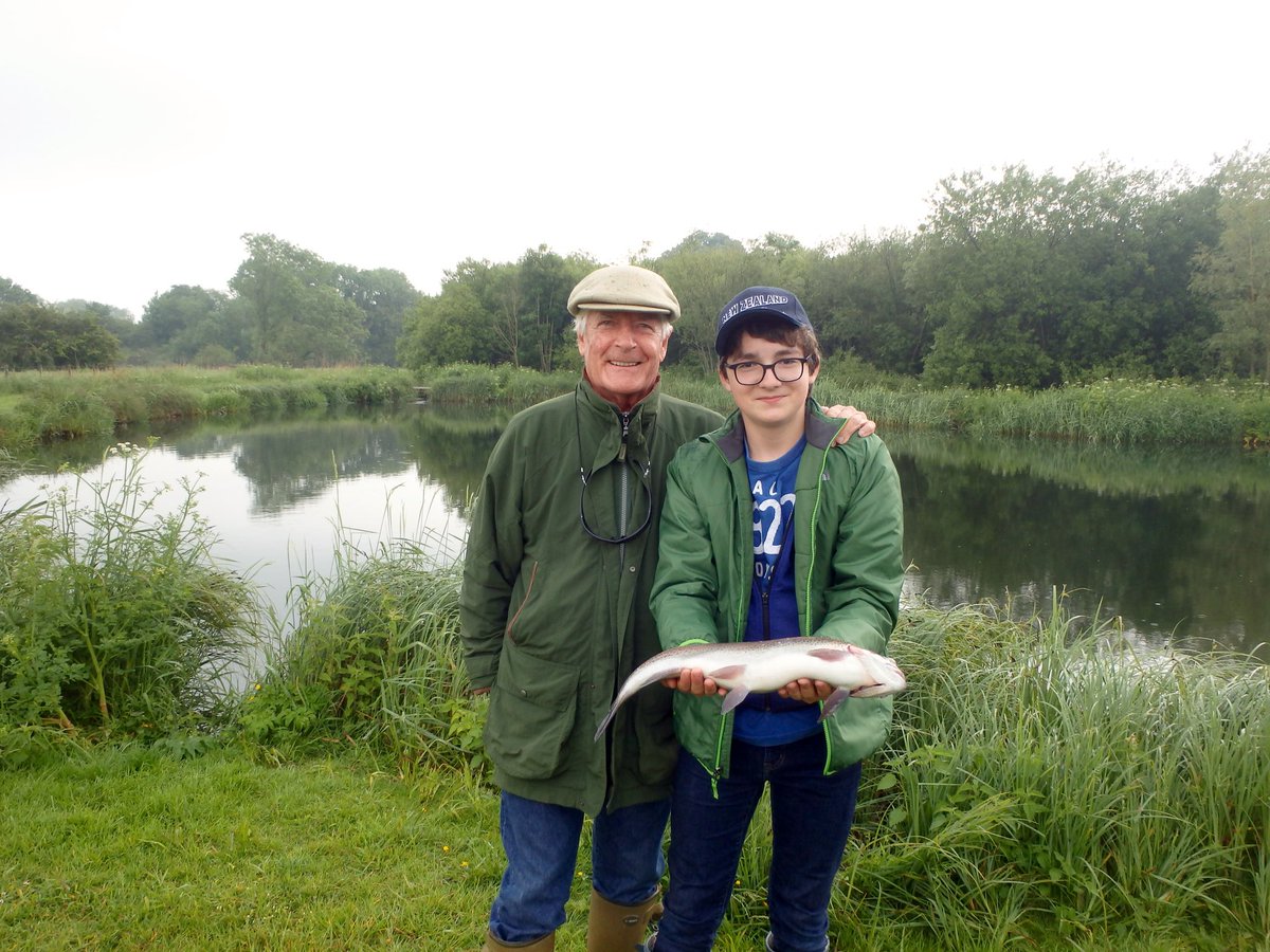grahamwaterton's tweet photo. It's a flyfishing grandfather's duty to introduce his grandson to flyfishing. Job done with success on an otherwise wet day. Rain? What rain. #flyfishing #ChalkStream #oneforthepot #startemyoung @bossingtonest8 https://t.co/b1A7Ha8jmy
