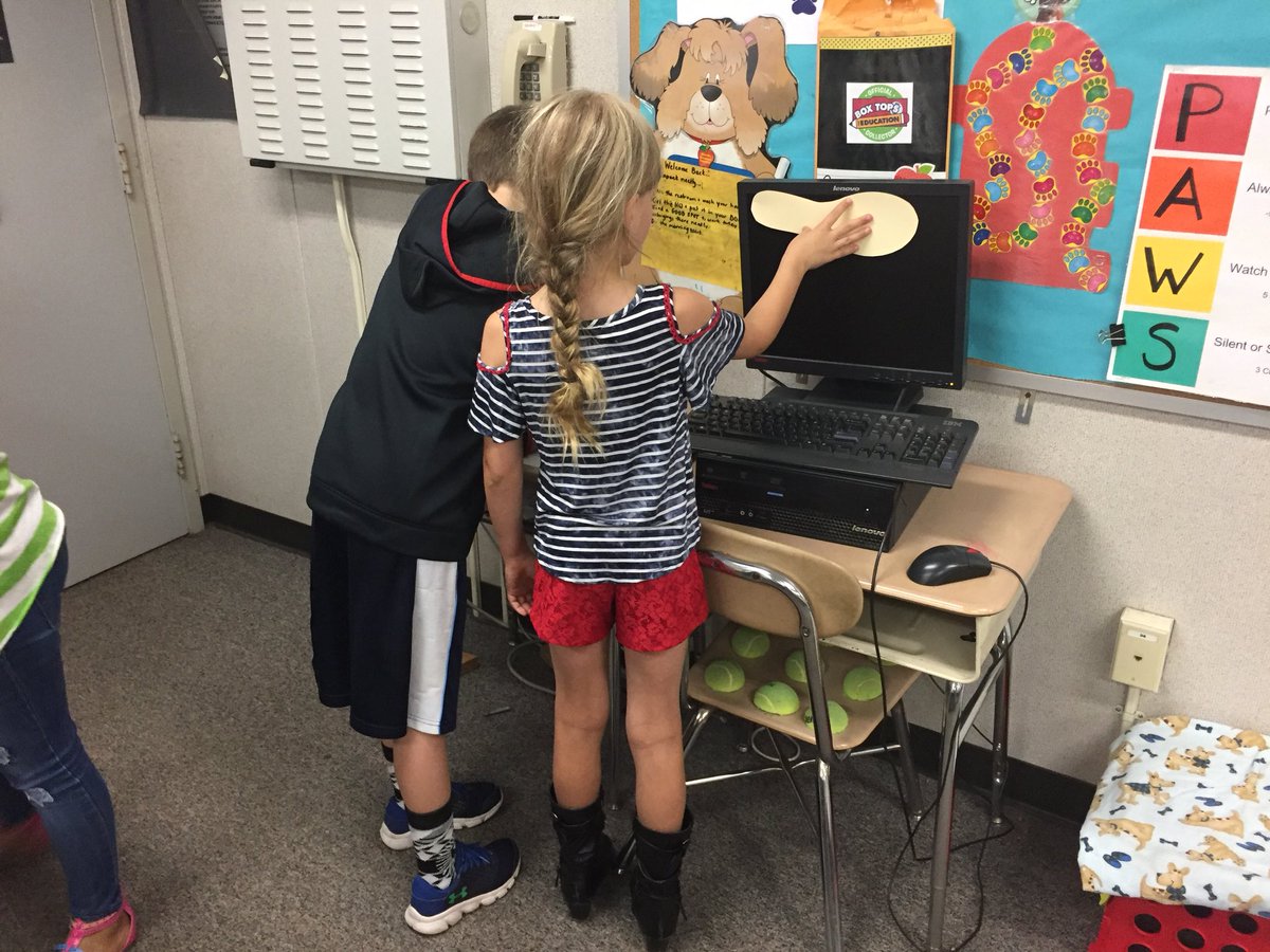 Measuring using teacher feet as our unit