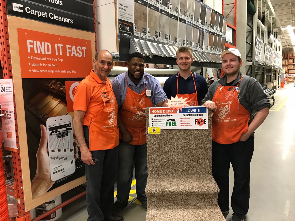 Stephan at ST1254 showing new hire tech Amar the carpeted step display and current offering