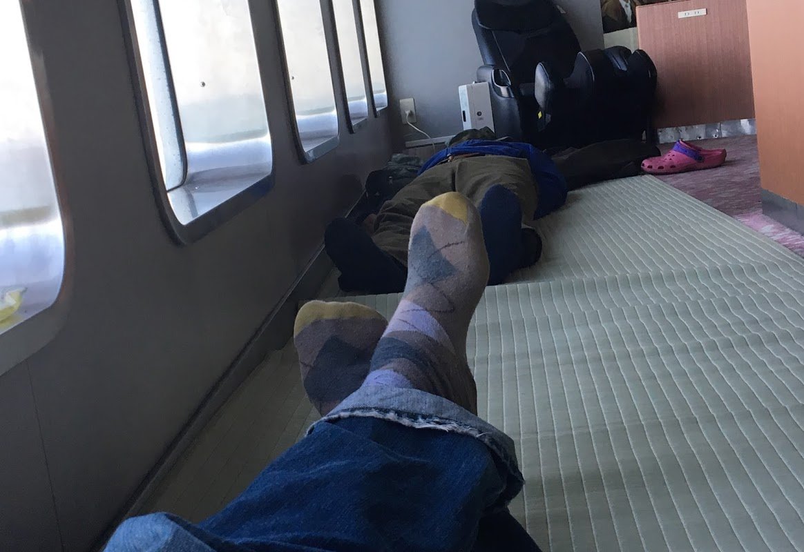 Gettin' Horizontal, Japan #Ferry.  Full service shiatsu chair in the background.  #setoinlandsea #japanbyferry #naptime