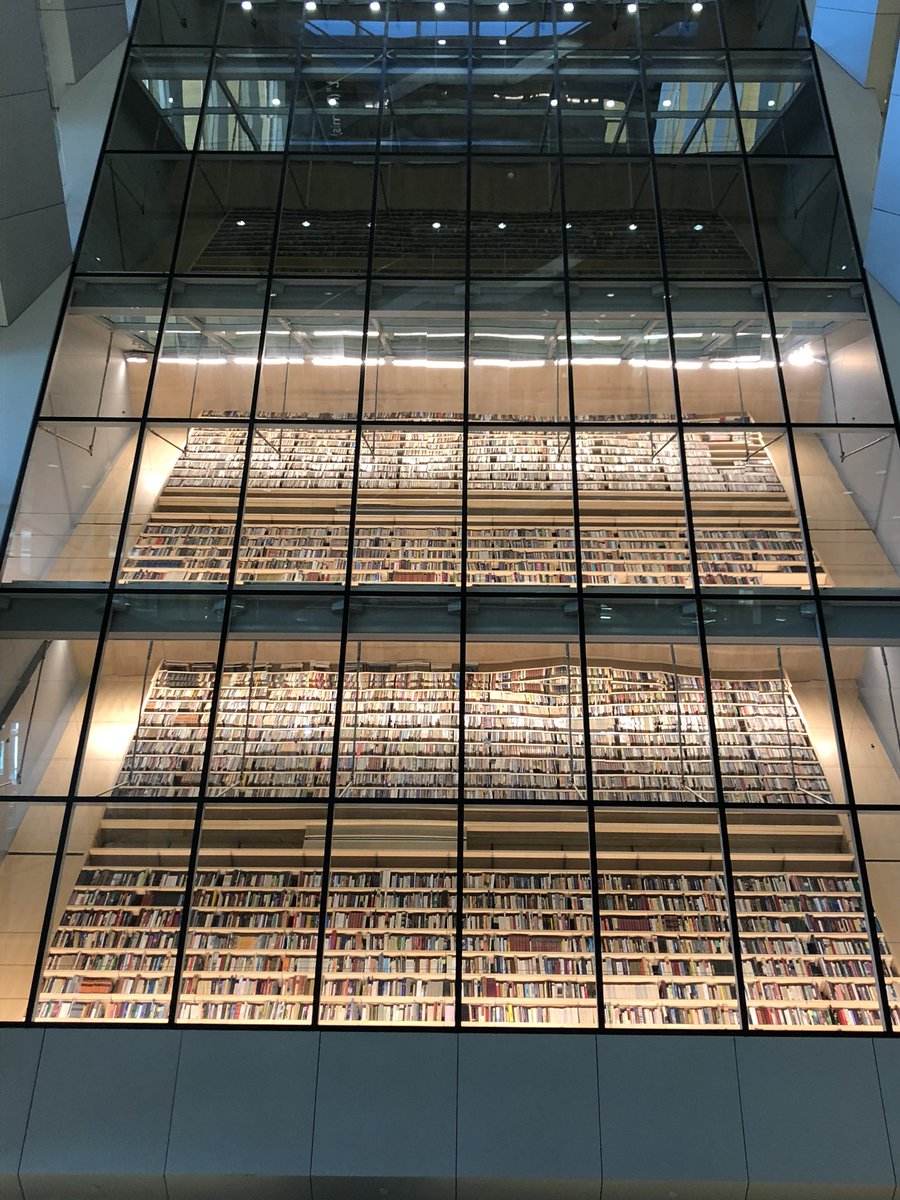 RCIA_EU's tweet photo. The Peoples Bookshelf in Rigas National Library. Books are donated to the library with a special personal account inside, explaining why the book is special to the person donating it. Anyone can donate a book and all the personal accounts are available online 📝 https://t.co/xKAyDLZrYt