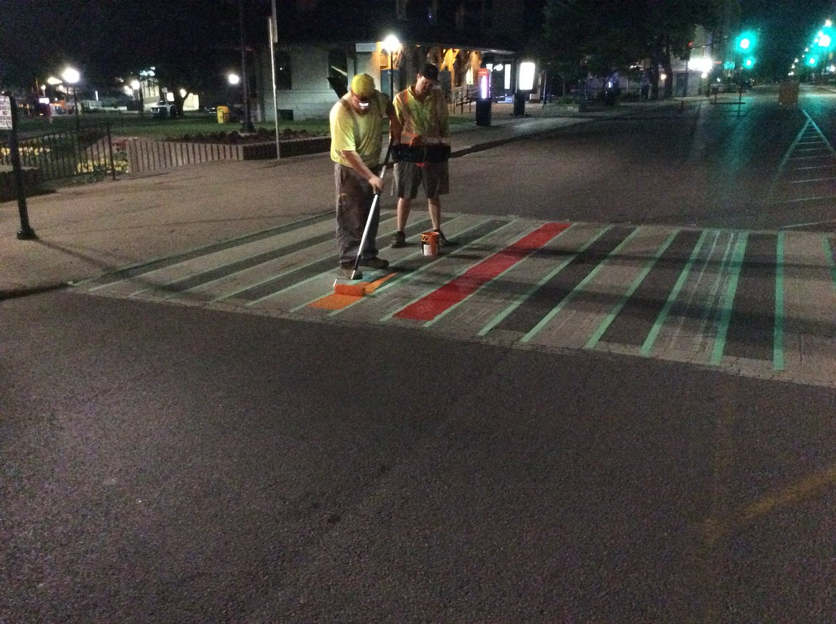 cityofkingston's tweet image. To mark Pride Month which begins this Friday, City of Kingston Public Works has painted the pedestrian crosswalk at City Hall in the signature Pride colours.