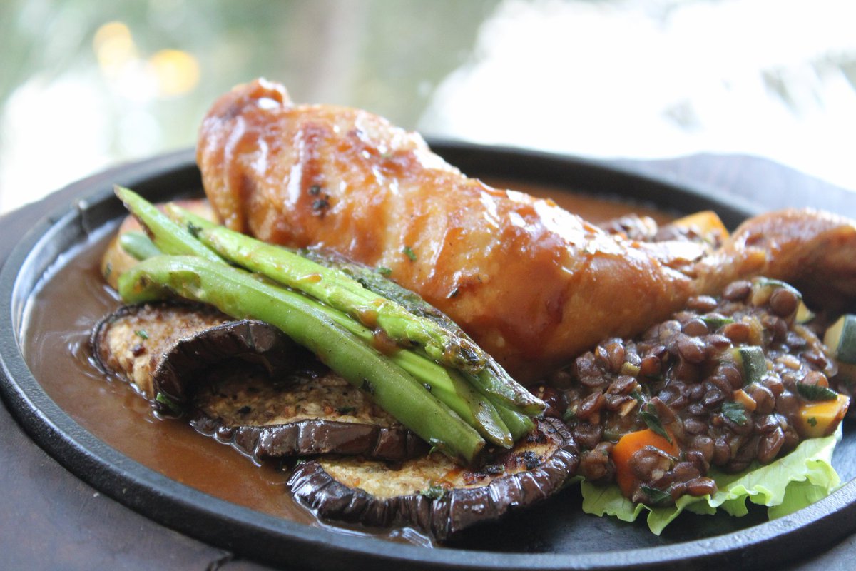 Our delicious confit leg of chicken is a delightful food experience. # lentils #potato #aubergine #lyonnaise #harissa #gravy #SummerTimeatLPQ